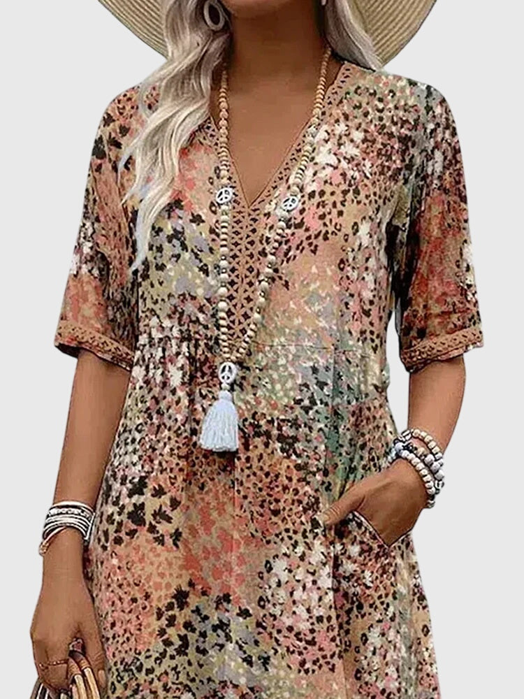 Bella | Elegante bloemen midi-jurk