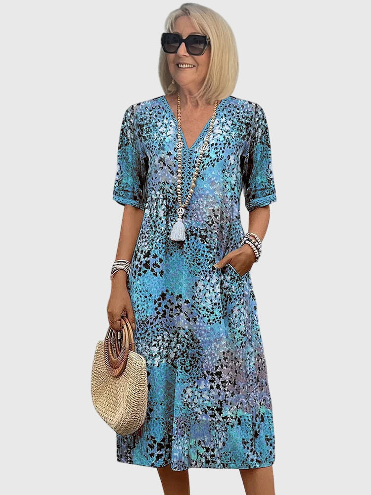 Bella | Elegante bloemen midi-jurk